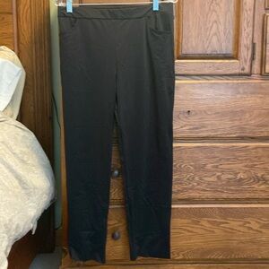 Size L By JJ black legging material pants with 2 front pockets. Pull on style.